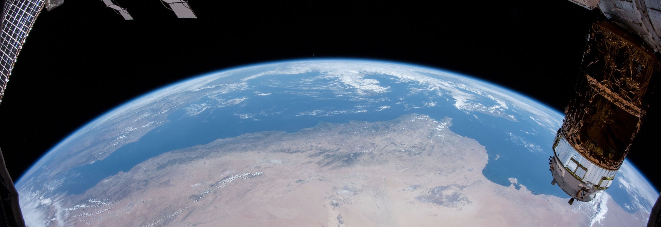 ss057e000244 (Oct. 6, 2018) --- A image captured from a time-lapse imagery sequence shows north Africa and the Mediterranean Sea as the International Space Station orbited 254 miles above the African continent. Japan's Kounotori H-II Transfer Vehicle-7 (HTV-7) is pictured at left attached to the Harmony module. Portions of the station's solar arrays and radiators are pictured at left.