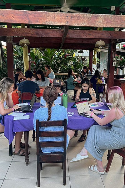 Women around a tropical table